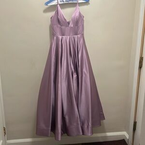 Lavender ball gown. Deep v neck.